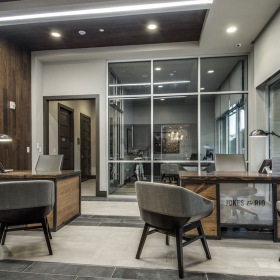 Jones & Rio leasing desks leasing desks in office with recessed lighting throughout